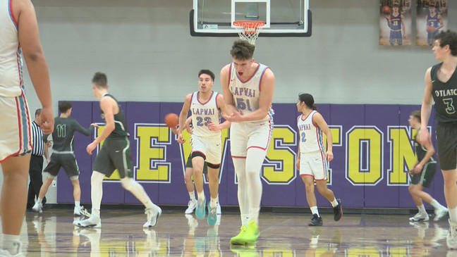 Kase Wynott celebrates after nailing a three pointer.{p}{/p}