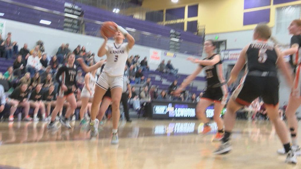 Laney Landmark drives to the basket in their district game against Troy.{&nbsp;}{p}{/p}