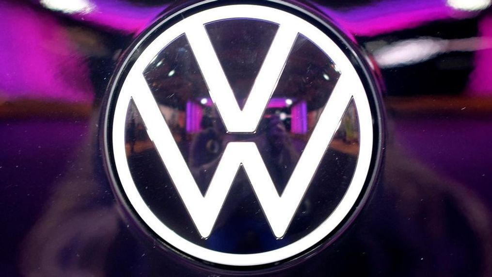 File---Picture taken on Nov.4, 2019 shows the VW logo on a car at a VW factory opening ceremony for electric cars in Zwickau,  Germany. (Sebastian Willnow/dpa via AP)