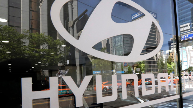 FILE - In this Wednesday, April 26, 2017, file photo, the logo of Hyundai Motor Co. is displayed at the automaker's showroom in Seoul, South Korea. (AP Photo/Lee Jin-man, File)