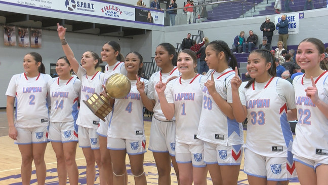 The Wildcats pose together as a team after beating Prairie.{&nbsp;}{p}{/p}