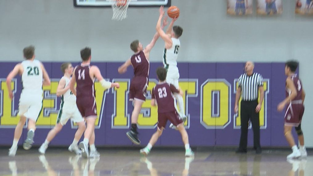 Everett Lovell shoots over a defender in their game against Kamiah.{&nbsp;}