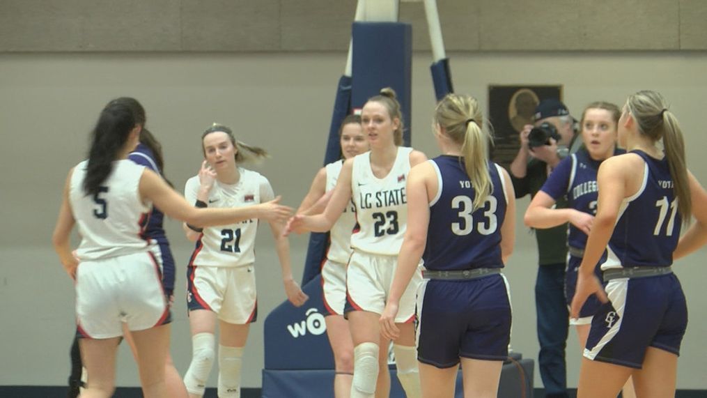 LC State women's basketball players high fiving each other after a play.{&nbsp;}{p}{/p}