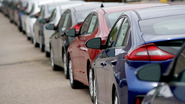 FILE- In this May 19, 2019, file photo  a line of unsold 2019 sedans sits at a Hyundai dealership in Littleton, Colo. (AP Photo/David Zalubowski, File)