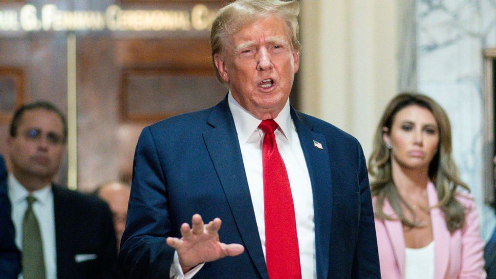 FILE - Former President Donald Trump speaks after exiting the courtroom for a break at New York Supreme Court, Dec. 7, 2023, in New York.    Trump has secured a bond sufficient to support an $83.3 million jury award granted to writer E. Jean Carroll during a January defamation trial stemming from rape claims she made against Trump, his lawyer said Friday, March 8, 2024, as she notified the federal judge who oversaw the trial that an appeal was underway.(AP Photo/Eduardo Munoz Alvarez, File)