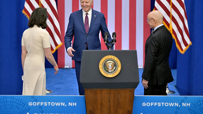 President Joe Biden, center, greets, Bowdoin College student Rose Keller, left, and her father Donald Kreis, right, who introduced Biden, during an event at a YMCA, Monday, March 11, 2024, in Goffstown, N.H. (AP Photo/Josh Reynolds)